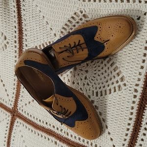 Men's tan and navy wingtip